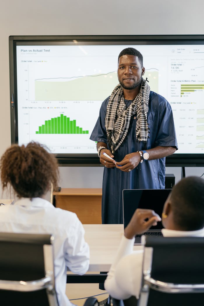 Business professional presenting data analysis in modern office setting.